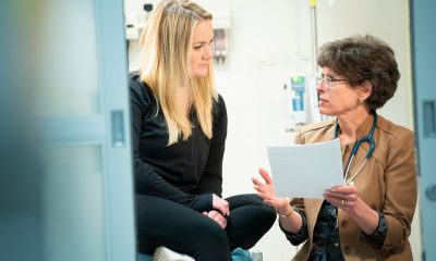 young woman patient consults with physician