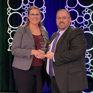 Nicole Kendall is pictured with Todd Philbrick, CAE, ICE-CCP, Chair of the I.C.E. Board of Directors.