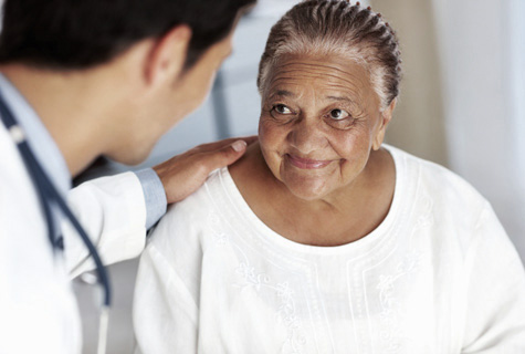 Mature black african american woman female w doctor iStock 000016133665 475x320