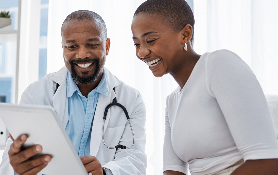 black doctor with black patient talking test results progress on tablet in hospital clinic shutterstock 2191880035 940215592 1