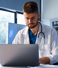 Story 2 MD on computer shutterstock 200x235